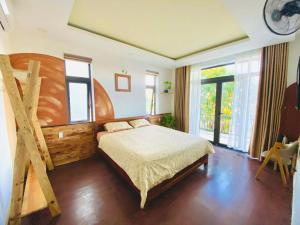 Postel nebo postele na pokoji v ubytování Laoxao Lakeview Homestay