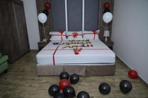 Postel nebo postele na pokoji v ubytování فندق سويت لافندر Lavender Suite Hotel