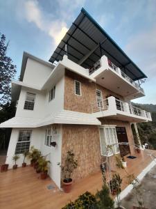 Photo de la galerie de l'établissement The Umri Lansdowne, à Lansdowne