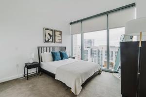 Ένα ή περισσότερα κρεβάτια σε δωμάτιο στο Blueground Rincon Hill 1bd apartment SFO-1748 +46 φωτογραφίες