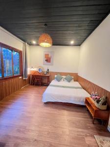 Postel nebo postele na pokoji v ubytování Quán Nhỏ Trên Đồi Homestay