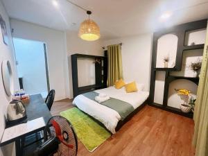 Postel nebo postele na pokoji v ubytování Quán Nhỏ Trên Đồi Homestay