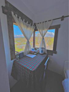 Postel nebo postele na pokoji v ubytování Quán Nhỏ Trên Đồi Homestay