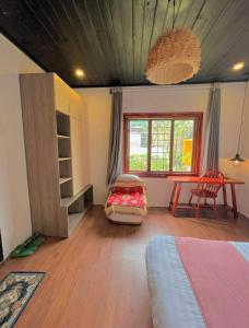 Postel nebo postele na pokoji v ubytování Quán Nhỏ Trên Đồi Homestay