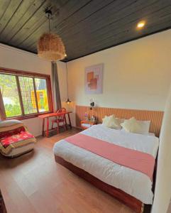 Postel nebo postele na pokoji v ubytování Quán Nhỏ Trên Đồi Homestay