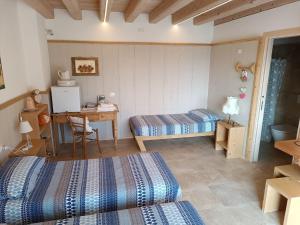 Ein Bett oder Betten in einem Zimmer der Unterkunft Locazione turista Cocodè