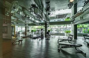 a gym with rows of exercise equipment in a large room at Mount Austin IKEA, AEON 10mins -Pool View- B122 in Johor Bahru
