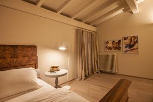 Posteľ alebo postele v izbe v ubytovaní B&B Antico Brolo