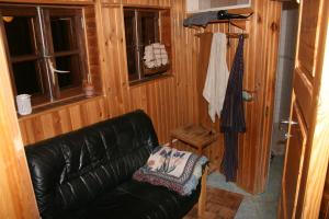 Posezení v ubytování Cozy and spacious accommodation with a sauna in Tartu!