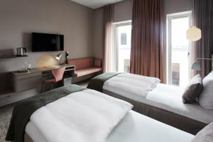 Hotel Odeon客房内的一张或多张床位