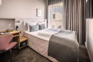Hotel Odeon客房内的一张或多张床位