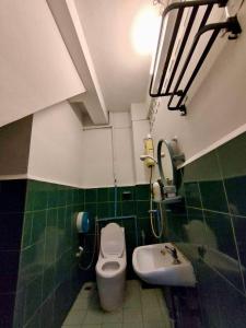 Et badeværelse på Bestiehome Women Only