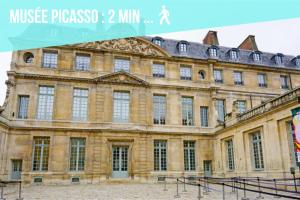 a large building with a sign that reads house professor min at Ômarais Guest House in Paris +12 photos