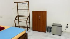 Ένα ή περισσότερα κρεβάτια σε δωμάτιο στο Elisha Place Hiriketiya