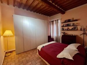 Postel nebo postele na pokoji v ubytování Suite del Ponticello - Elba Affitti