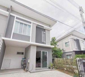 a white house with a fence in front of it at Beautiful 2 Floor Home in Phuket Town in Phuket Town