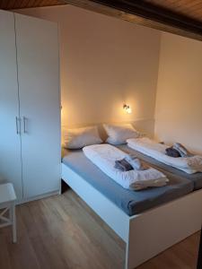 Katil atau katil-katil dalam bilik di Ferienhaus Meiß