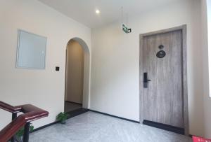 Снимка в галерията на Yish Cinema Serviced Apartment B&B в Шанхай