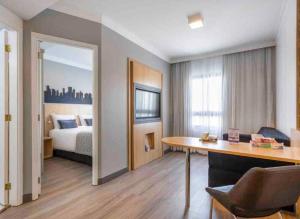 Postel nebo postele na pokoji v ubytování Flat em pinheiros equipado em hotel 4 stat