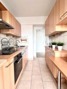 Köök või kööginurk majutusasutuses Elegant 2pcs Proche Bruxelles