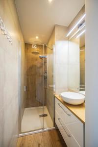 Kúpeľňa v ubytovaní Apartament Reymonta 15 SurfingBird Kołobrzeg
