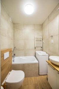 Kúpeľňa v ubytovaní Apartament Reymonta 15 SurfingBird Kołobrzeg + 18 fotografií