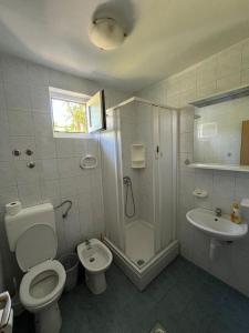 Kúpeľňa v ubytovaní Apartmani Eva