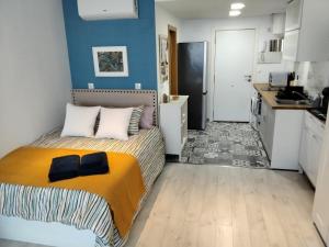 Kuchyňa alebo kuchynka v ubytovaní LOFT en playa paraíso