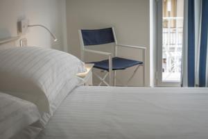 Voodi või voodid majutusasutuse Murè Hotel Numana toas