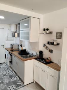 Kuchyňa alebo kuchynka v ubytovaní LOFT en playa paraíso