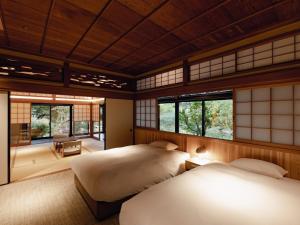 Lova arba lovos apgyvendinimo įstaigoje NIPPONIA HOTEL 伊賀上野 城下町
