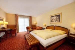 Voodi või voodid majutusasutuse Hotel Friesacher toas