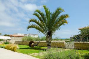 Κήπος έξω από το Sabbia Dorata