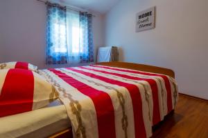Posteľ alebo postele v izbe v ubytovaní VUKIC