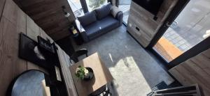 an overhead view of a living room with a couch and a table at Keller Apartment - DQ Tower in Sulz am Neckar