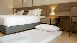 Letto o letti in una camera di Luxury Genting Studio Suite with Swimming Pool and Netflix