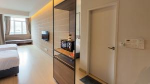 Letto o letti in una camera di Luxury Genting Studio Suite with Swimming Pool and Netflix