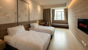 Letto o letti in una camera di Luxury Genting Studio Suite with Swimming Pool and Netflix