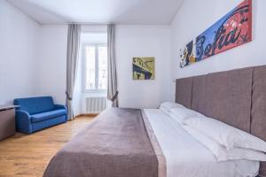 Postel nebo postele na pokoji v ubytování Rome Armony Suites