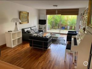 Posezení v ubytování Maison Eysines- A10