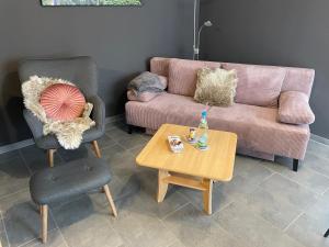 Posezení v ubytování Ferienwohnung Sarah & Thorsten Blum