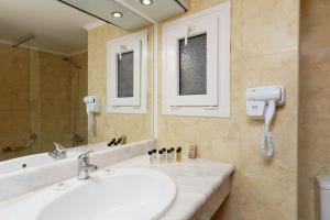Koupelna v ubytování Ariti Grand Hotel