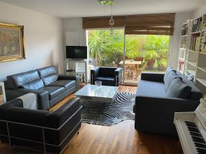 Posezení v ubytování Maison Eysines- A10