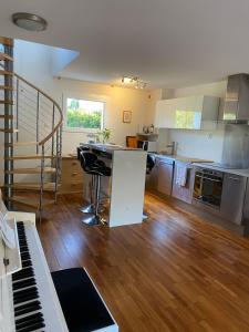 Kuchyň nebo kuchyňský kout v ubytování Maison Eysines- A10