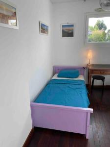 Postel nebo postele na pokoji v ubytování Maison Eysines- A10