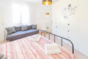 Postel nebo postele na pokoji v ubytování 012D - Moneglia loft con terrazza privata - Nel cuore del centro a 100metri dal MARE