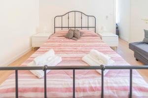 Postel nebo postele na pokoji v ubytování 012D - Moneglia loft con terrazza privata - Nel cuore del centro a 100metri dal MARE