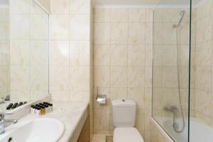 Koupelna v ubytování Ariti Grand Hotel