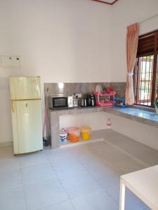 Kuchyň nebo kuchyňský kout v ubytování Oasis Suite
