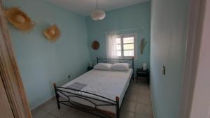 Posteľ alebo postele v izbe v ubytovaní Vintage Beach House